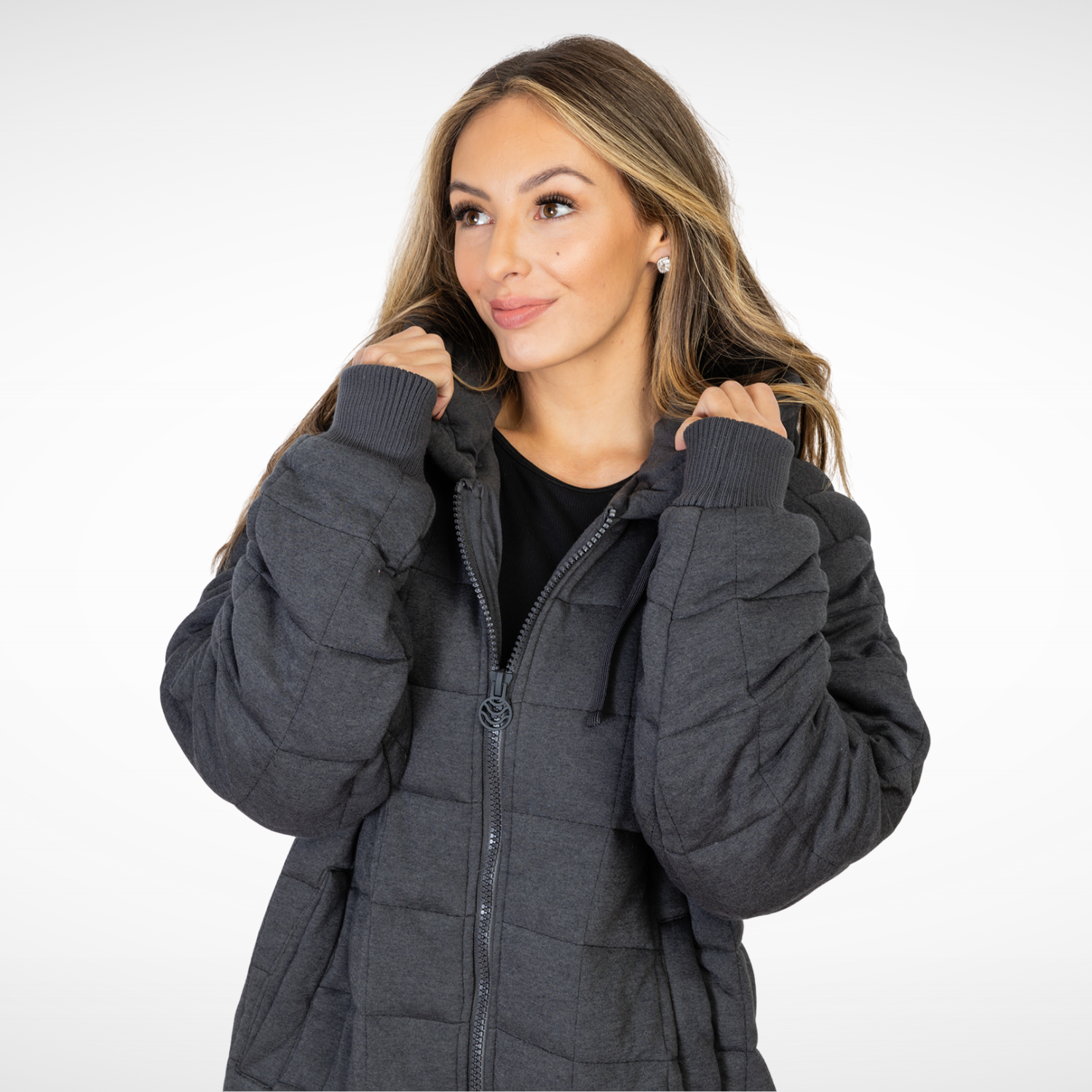 woman wearing cozy charcoal weighted therahoodie